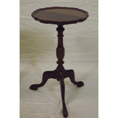 57 - Pair of Edwardian mahogany lamp tables with piecrust borders, vase turned columns, on hipped tripods