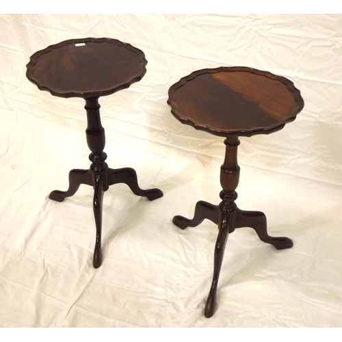 57 - Pair of Edwardian mahogany lamp tables with piecrust borders, vase turned columns, on hipped tripods