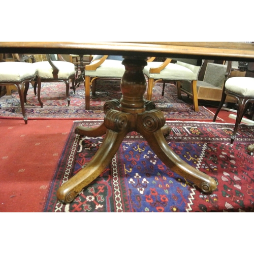 60 - Victorian mahogany library or dining table with lift-up top, round corners, on baluster turned colum... 