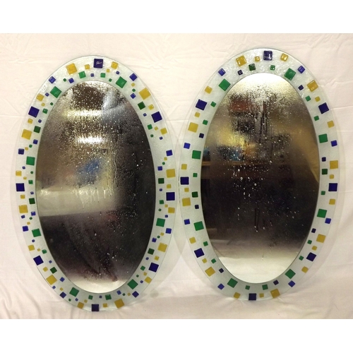 62 - Pair of oval Murano style wall mirrors with ornate multi-coloured glass decoration