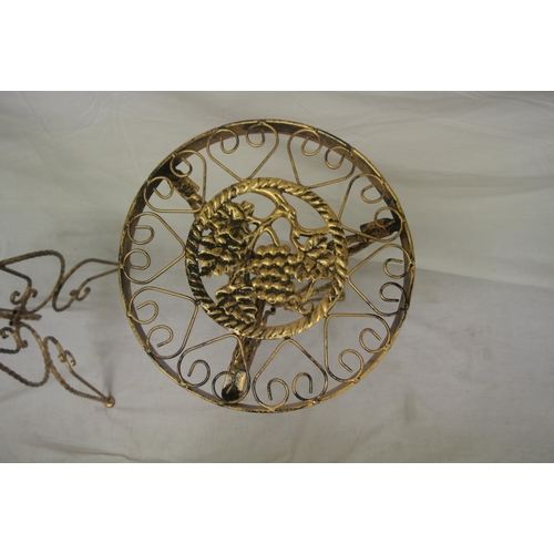 158 - Pair of wrought iron jardiniere stands with foliate and grapevine decoration, and shaped legs