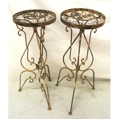 158 - Pair of wrought iron jardiniere stands with foliate and grapevine decoration, and shaped legs