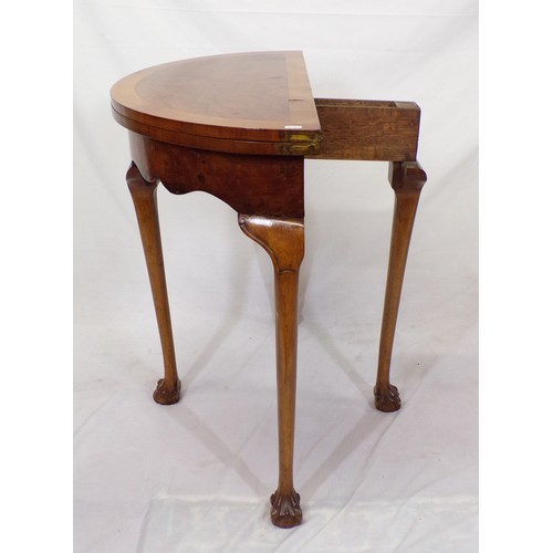 180 - Edwardian walnut and satinwood crossbanded demi lune card table with fold-over top, pull-out support... 