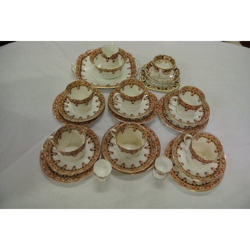 37 - Twenty-four piece Stanley English porcelain tea service with foliate and gilt decoration