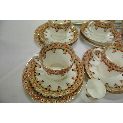 37 - Twenty-four piece Stanley English porcelain tea service with foliate and gilt decoration