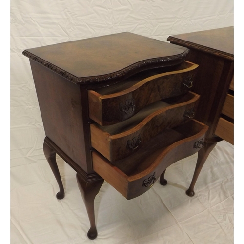 45 - Pair of Edwardian walnut serpentine fronted side chests with carved borders, shaped drawers with bra... 