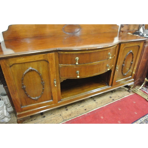 65 - Edwardian mahogany bow fronted sideboard with tray back, two central drawers, shelved side presses w... 