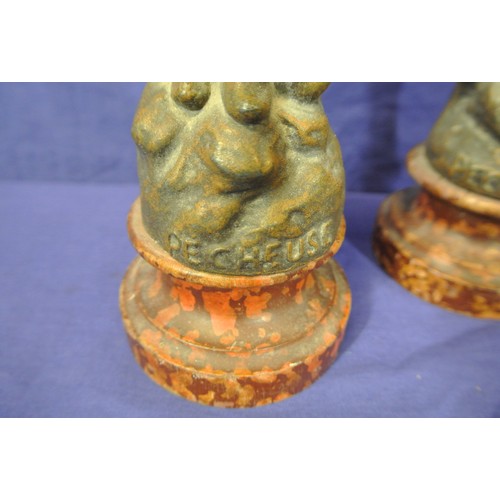163 - Pair of carved Pecheur figures on round bases , small chip in base