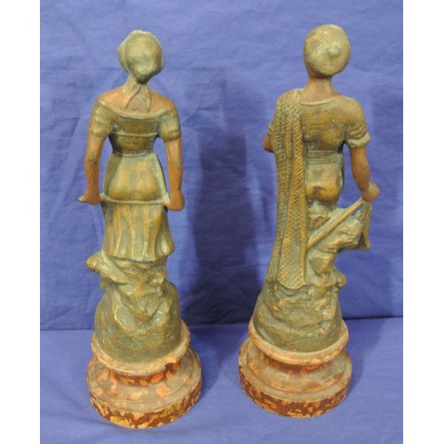 163 - Pair of carved Pecheur figures on round bases , small chip in base