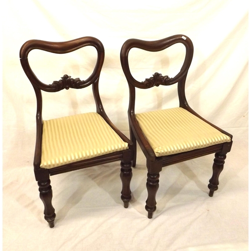 288 - Pair of Victorian spoonback walnut dining chairs with carved rails, upholstered seats, on baluster t... 