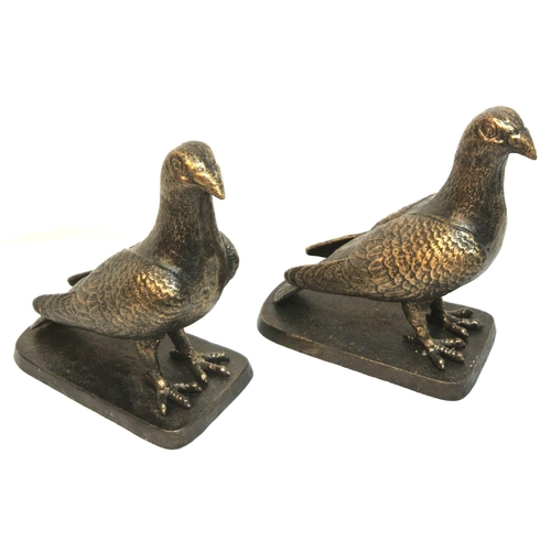 169 - Pair of Edwardian style cast iron figures of birds on shaped stands