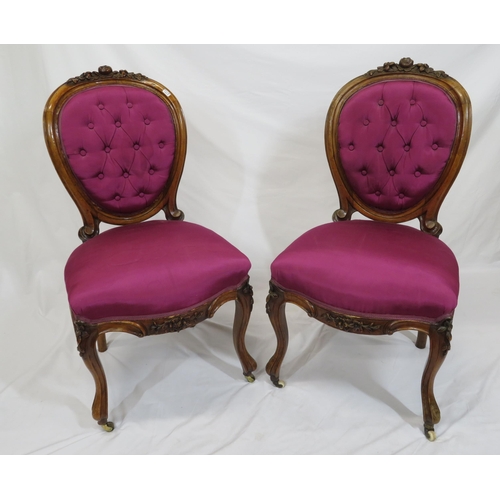 284 - Pair of Victorian mahogany spoon back occasional chairs with foliate carving, button upholstery, ser... 