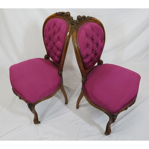 284 - Pair of Victorian mahogany spoon back occasional chairs with foliate carving, button upholstery, ser... 