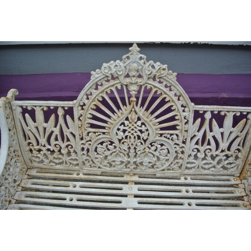 285 - Victorian style cast iron garden seat with domed back, foliate and scroll decoration, shaped legs, s... 