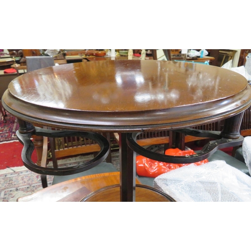 31 - Victorian mahogany two tier occasional table with pull-out shaped holders, on cabriole legs