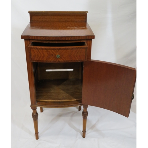 39 - Edwardian inlaid satinwood locker with bowed drawer and press under, brass handles, on turned taperi... 