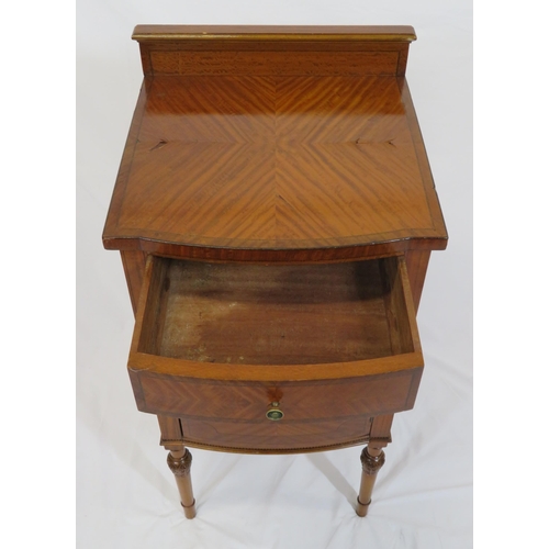 39 - Edwardian inlaid satinwood locker with bowed drawer and press under, brass handles, on turned taperi... 