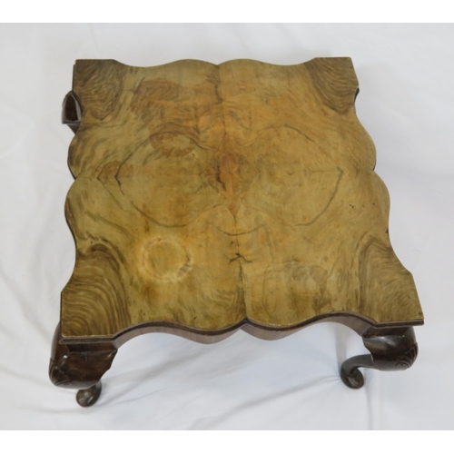 51 - Edwardian walnut occasional or coffee table with serpentine borders and apron, on shell carved cabri... 