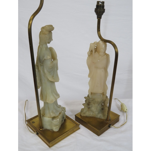 52 - Two Oriental alabaster figured lamps with square brass bases