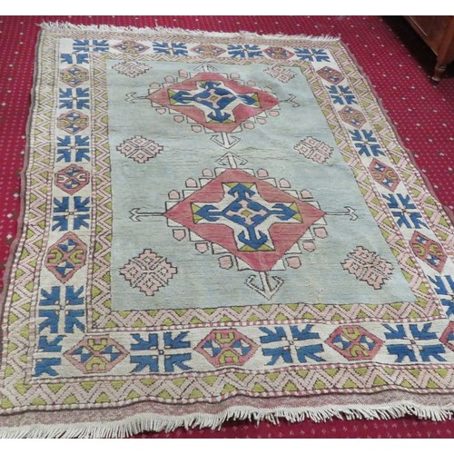 196 - Iranian style red ground hearth rug with diamond pattern. 200 x140 cm