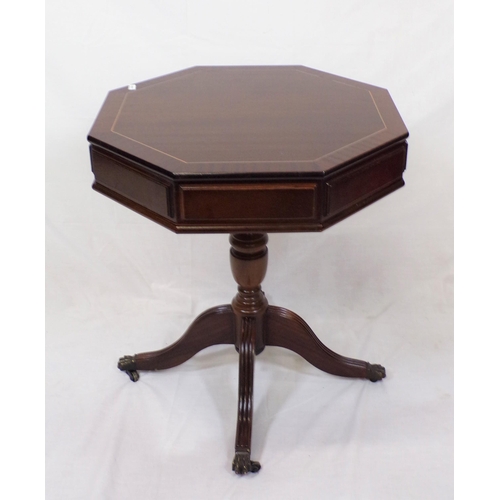 14 - Octagonal shaped mahogany centre table with frieze drawers, brass turned column, on reeded quadrapod... 