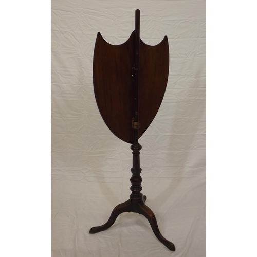 49 - Victorian mahogany pole screen having coat of arms and floral decorated shield shaped shade, turned ... 