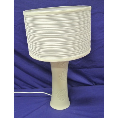 57 - Round Belleek electric lamp with foliate decoration