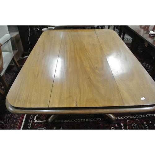 160 - Victorian mahogany library or dining table with lift-up top, round corners, on baluster turned colum... 