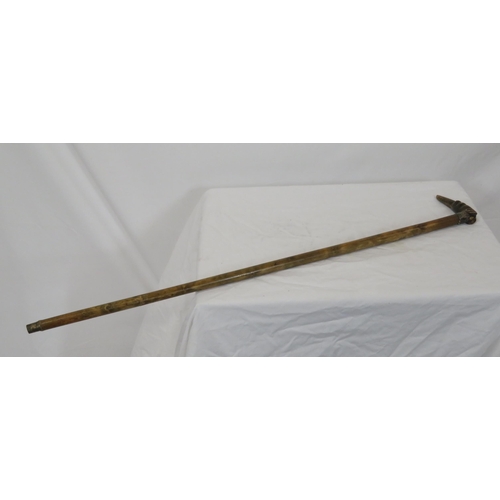 104 - Edwardian walking stick with worked metal mounts and shaped handle