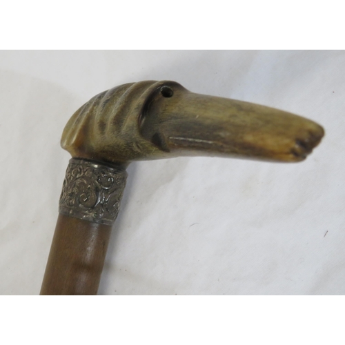 104 - Edwardian walking stick with worked metal mounts and shaped handle