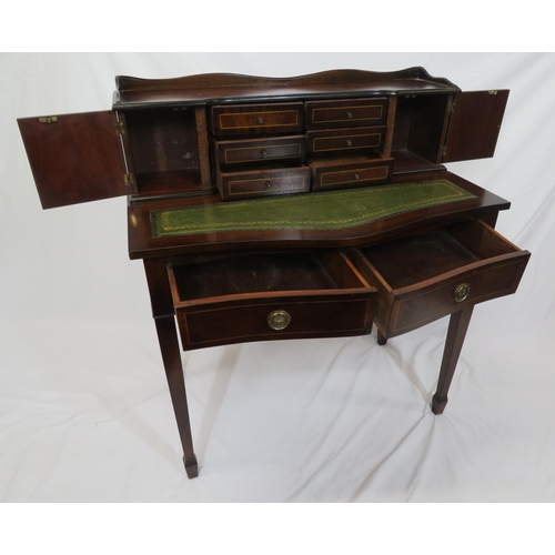 110 - Edwardian inlaid mahogany serpentine fronted bonheur de jour with drawers and presses, two shaped fr... 