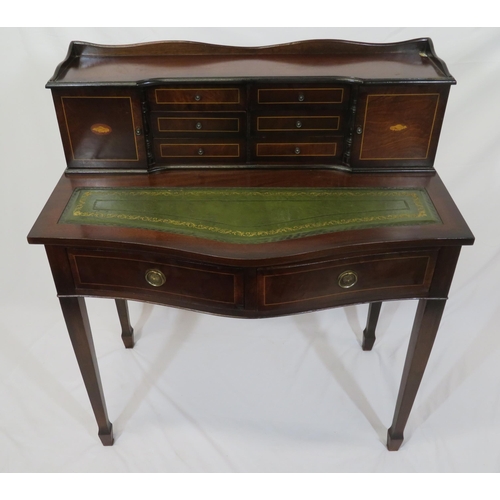 110 - Edwardian inlaid mahogany serpentine fronted bonheur de jour with drawers and presses, two shaped fr... 