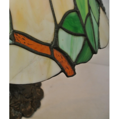 117 - Art Deco style table lamp with panelled foliate decorated shade, baluster column, on leaf decorated ... 