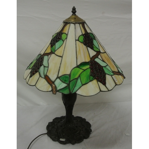 117 - Art Deco style table lamp with panelled foliate decorated shade, baluster column, on leaf decorated ... 