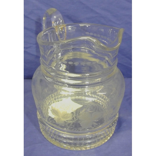 124 - Old cut glass water jug with grapevine and faceted decoration