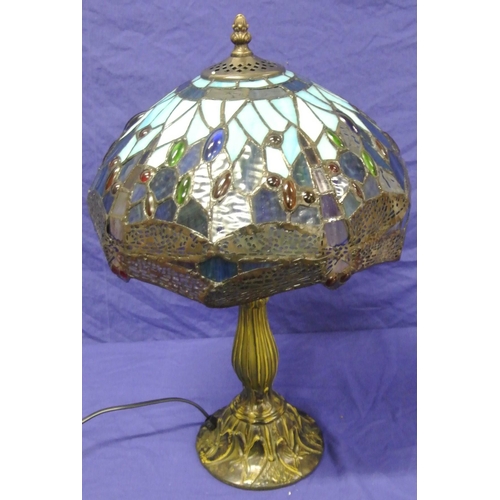 127 - Art Deco style electric table lamp with ornate multi-coloured shade, baluster column, on shaped roun... 