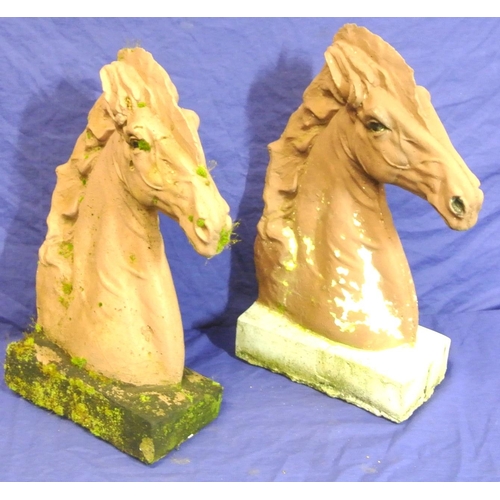 147 - Pair of cast horses heads on oblong bases