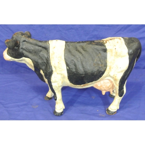 148 - Ornate cast iron ornament of a friesan cow