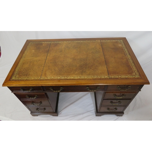 155 - Edwardian mahogany pedestal desk with leatherette top, three frieze drawers, six side drawers with d... 