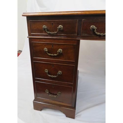 155 - Edwardian mahogany pedestal desk with leatherette top, three frieze drawers, six side drawers with d... 