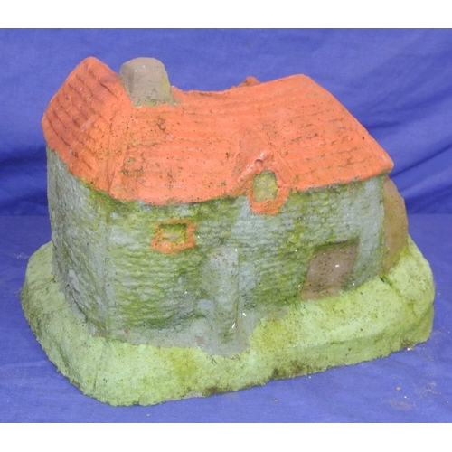 164 - Carved stone model of a mill house on shaped base