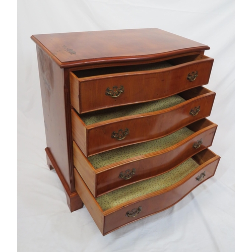 175 - Edwardian style yew serpentine fronted chest of four drawers with brass drop handles and pierced bac... 