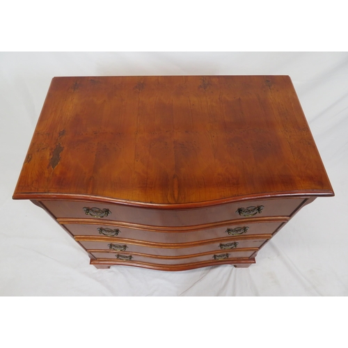 175 - Edwardian style yew serpentine fronted chest of four drawers with brass drop handles and pierced bac... 