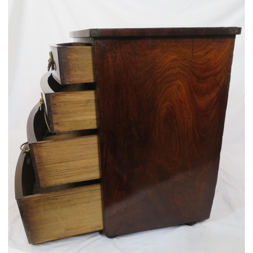 180 - Mahogany bow fronted chest of four drawers with brass drop handles, on bun feet