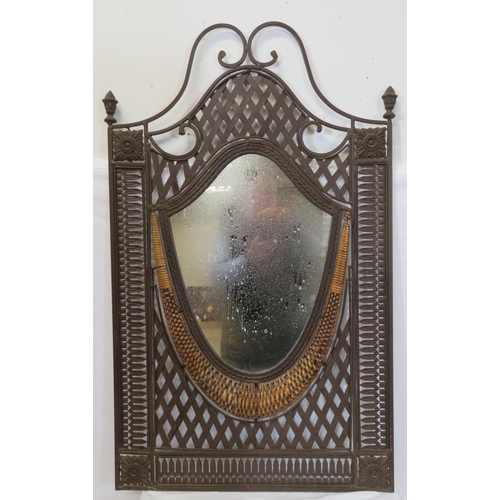 191 - Arts & Crafts style metal framed heart shaped wall mirror with scroll decoration