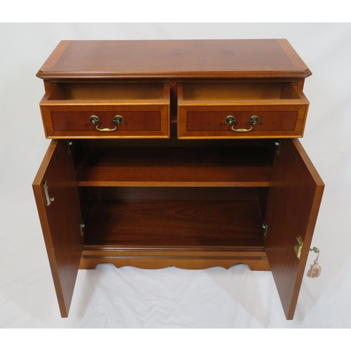 21 - Edwardian inlaid yew bookcase with two frieze drawers, brass drop handles, shelved interior, on brac... 
