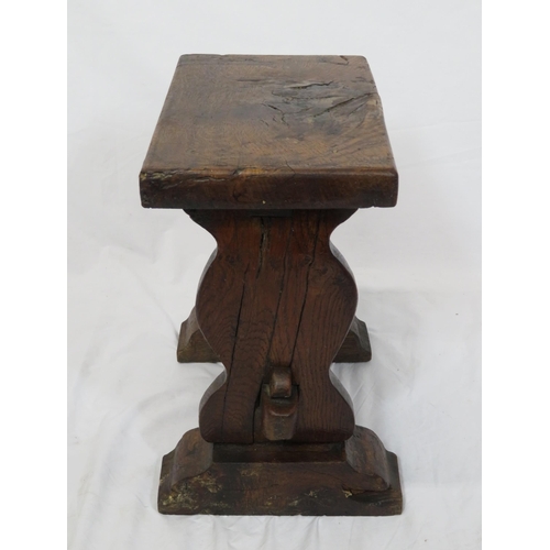 28 - Arts & Crafts oak oblong stool with shaped sided on bracket feet