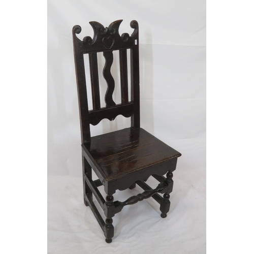 281 - Georgian style oak hall chair with scroll decorated back, turned legs with stretchers