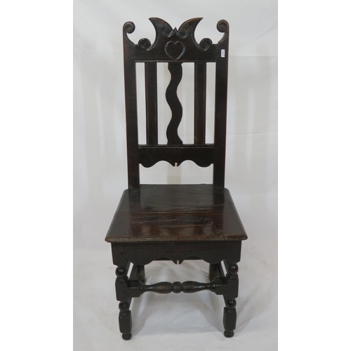 281 - Georgian style oak hall chair with scroll decorated back, turned legs with stretchers