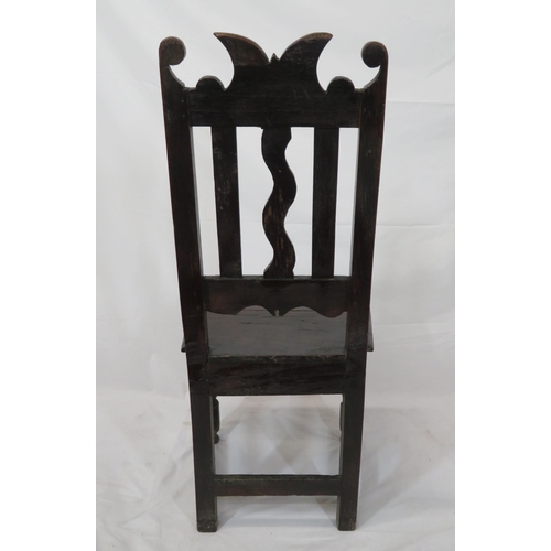 281 - Georgian style oak hall chair with scroll decorated back, turned legs with stretchers